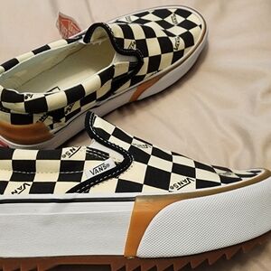 Vans Checkerboard Slip-On Sneakers in Black & Cream